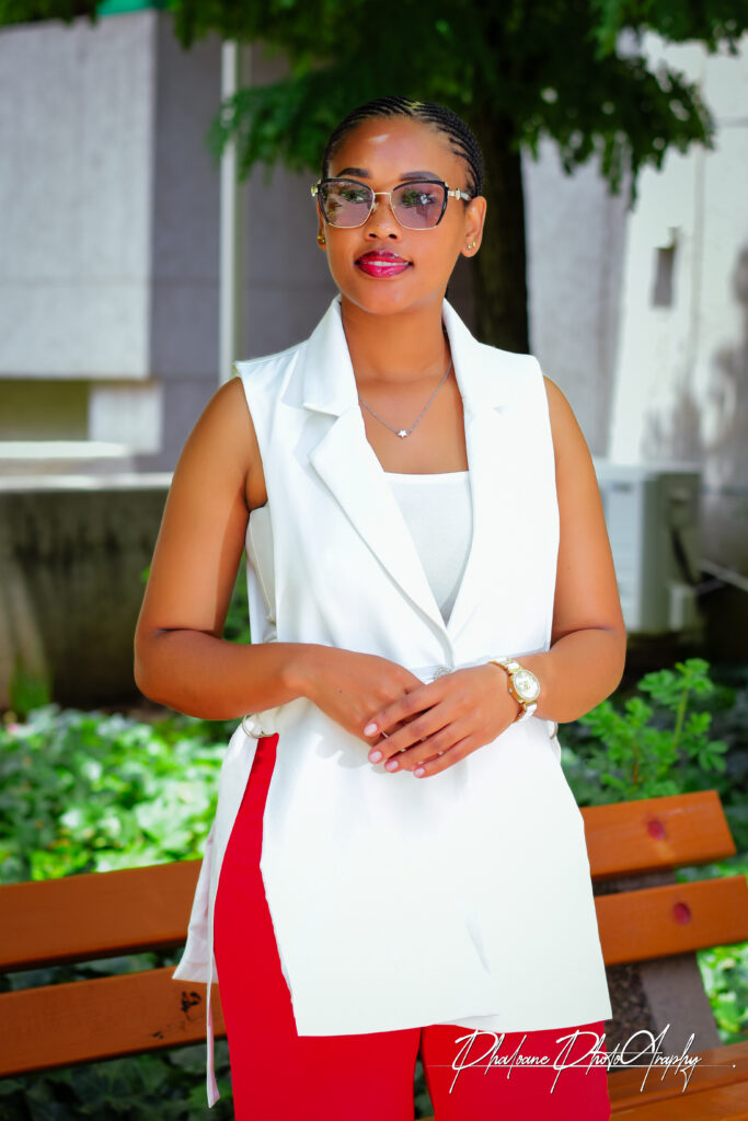 A professional lady standing.